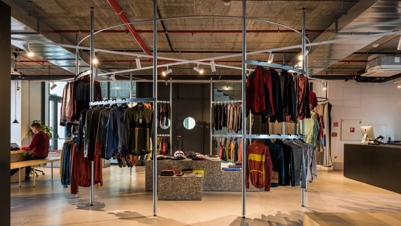 clothes on a rack inside a shop